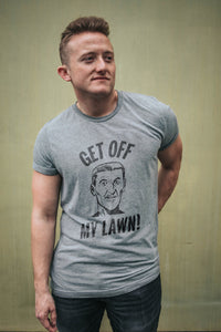 Funny, sarcastic graphic t-shirt with the meme "Get Off My Lawn" in text and an image of an angry old man, also known as a Boomer.